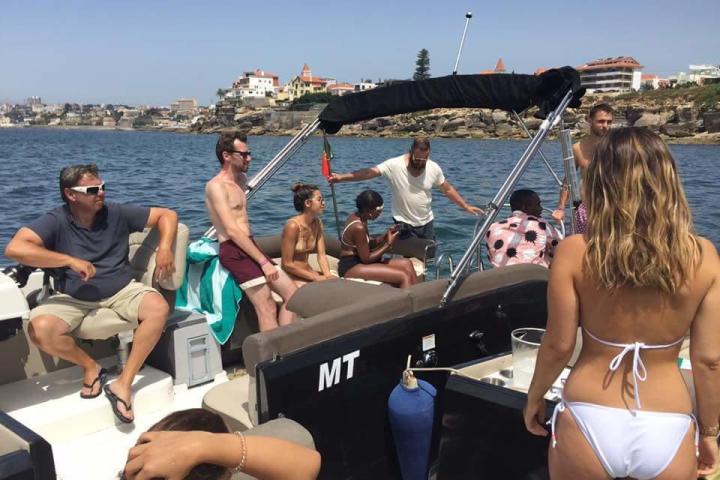 a group of people on a boat in the water