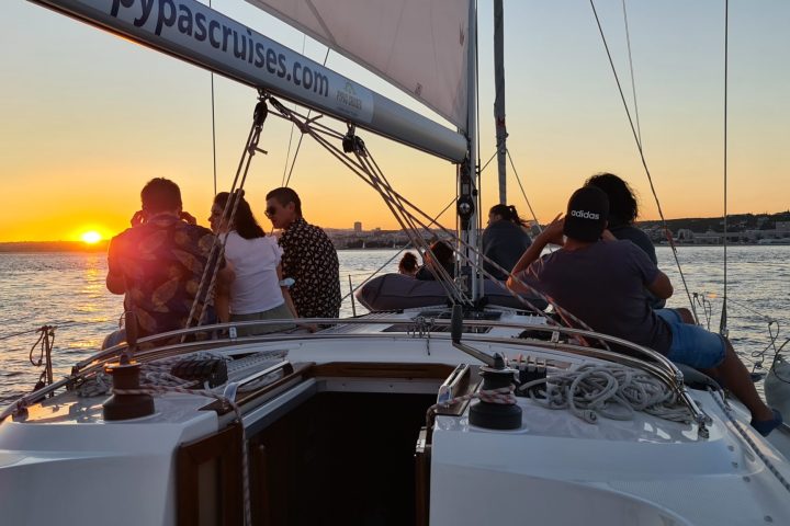 a group of people in a boat on a body of water